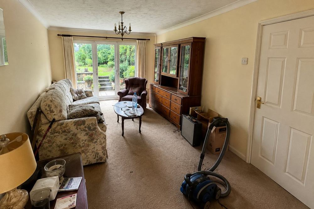 Cluttered room before clearance